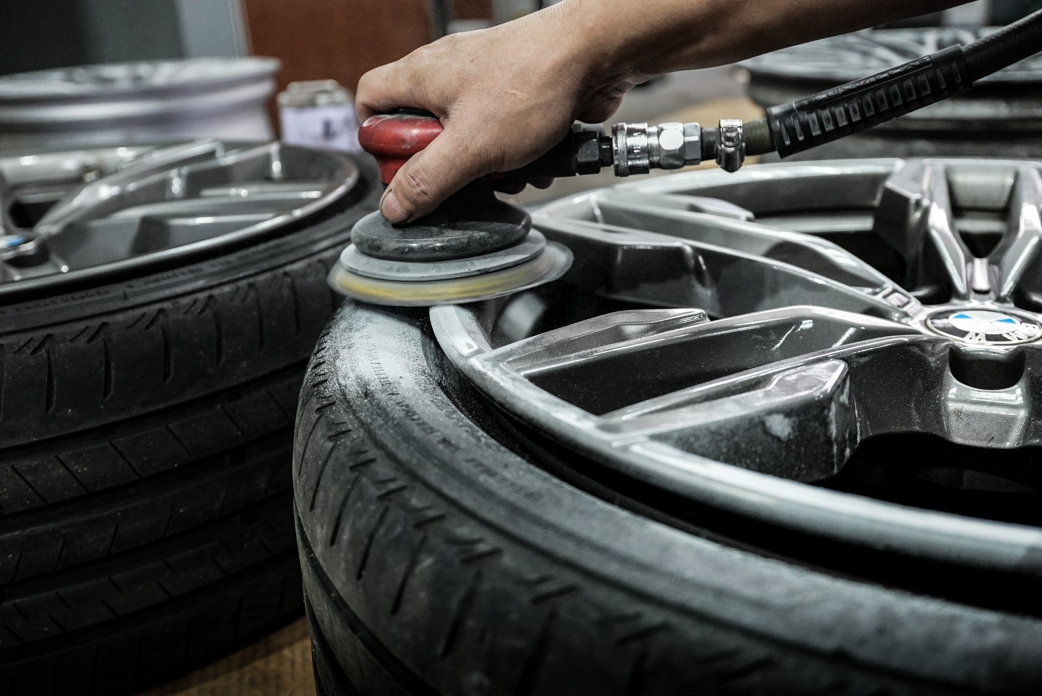 Pitstop Tyres mechanic repairing rims, highlighting our expert rim refurbishment services